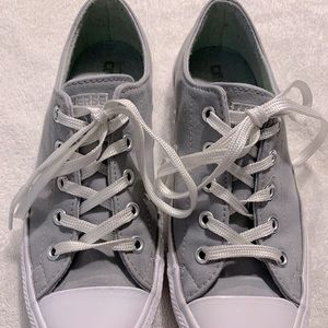 Grey and white Converse All Stars